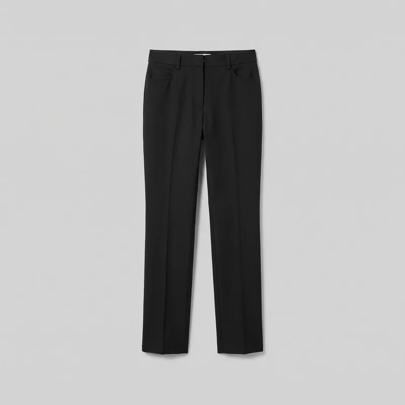 Women's black tailored full-length trousers shown alone in a front view. The trousers have a structured waistband with belt loops, a concealed fly placket, two front hip pockets, a small coin pocket above one hip pocket, pressed center creases, visible front seam and pocket stitching, straight legs, and flat hems.