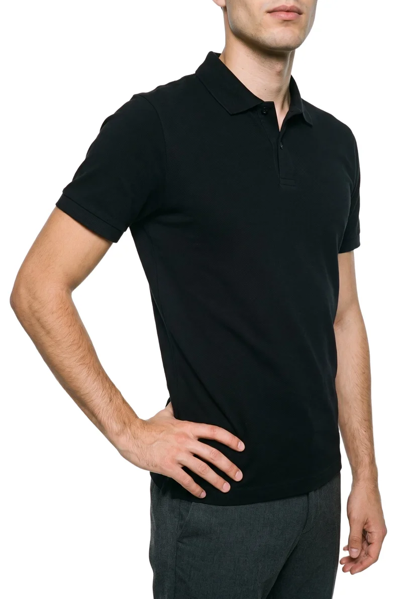 Men's Black Polo Shirt, Torso at Angled front, Studio Cutout lighting