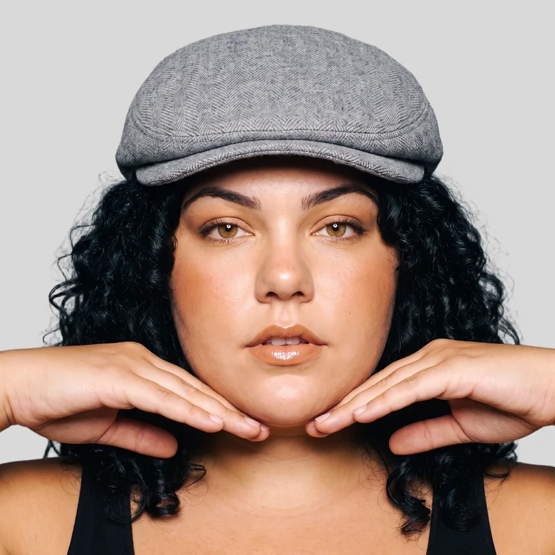 Women's Grey Wool Flat Cap, Head at Front, Studio Cutout lighting