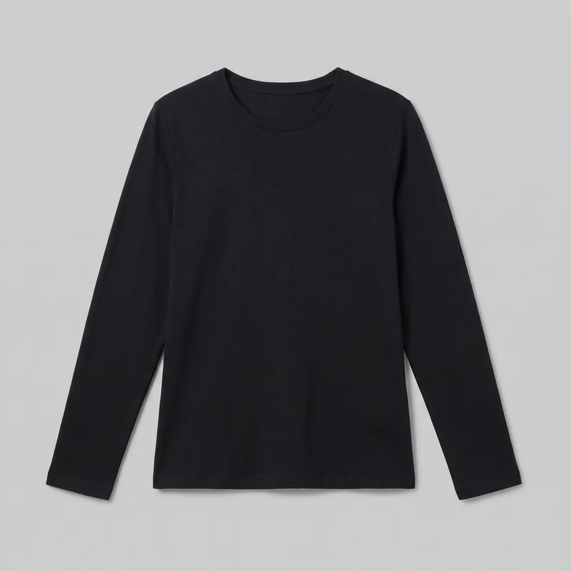 A standalone front view of a women's black long-sleeve crew-neck T-shirt. The top has a regular straight silhouette, set-in shoulders, full-length sleeves, a narrow bound crew collar with visible topstitching, and a straight full-length hem. The front is plain, with no visible pockets, closures, logos, prints, patches, embroidery, or embellishments.