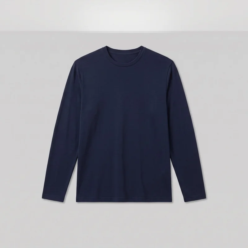 A mostly complete navy long-sleeve crewneck top is laid flat in a front view. The shirt has a straight silhouette, round neckline with a narrow stitched neckband, set-in sleeves with plain hems, shoulder seams, and a straight stitched bottom hem.