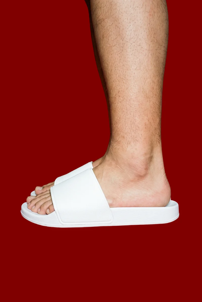 Men's White Sliders, Ankle at Side, Studio Cutout lighting