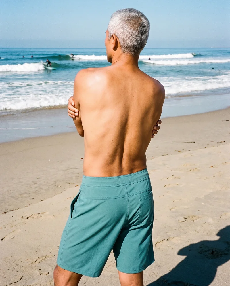 Teal Board Shorts, Three-quarter length at Back, Flash Editorial lighting