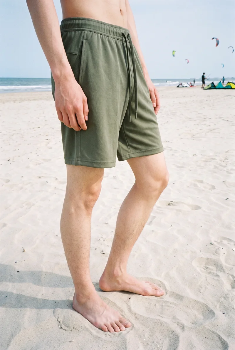 Men's Olive Training Shorts, Lower body at Side, Clean Catalog lighting