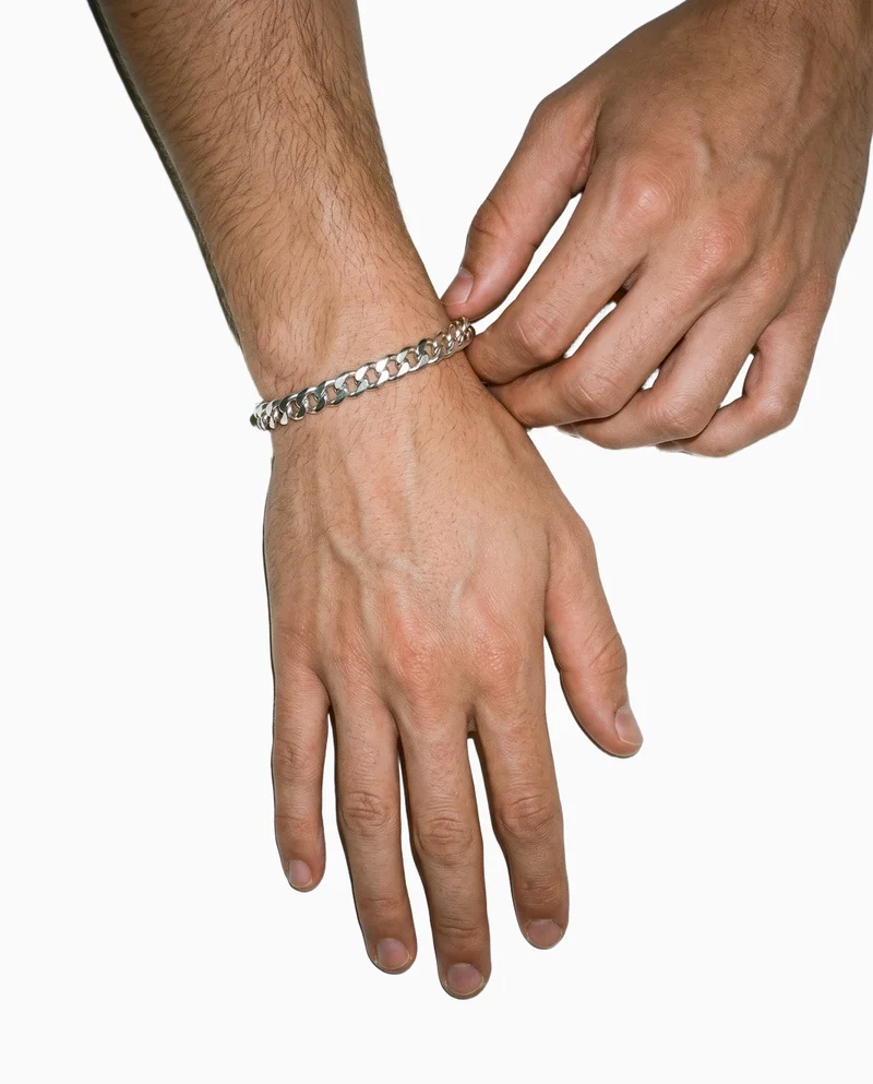 Men's Silver Chain Bracelet, Hand and wrist at Top, Studio Cutout lighting