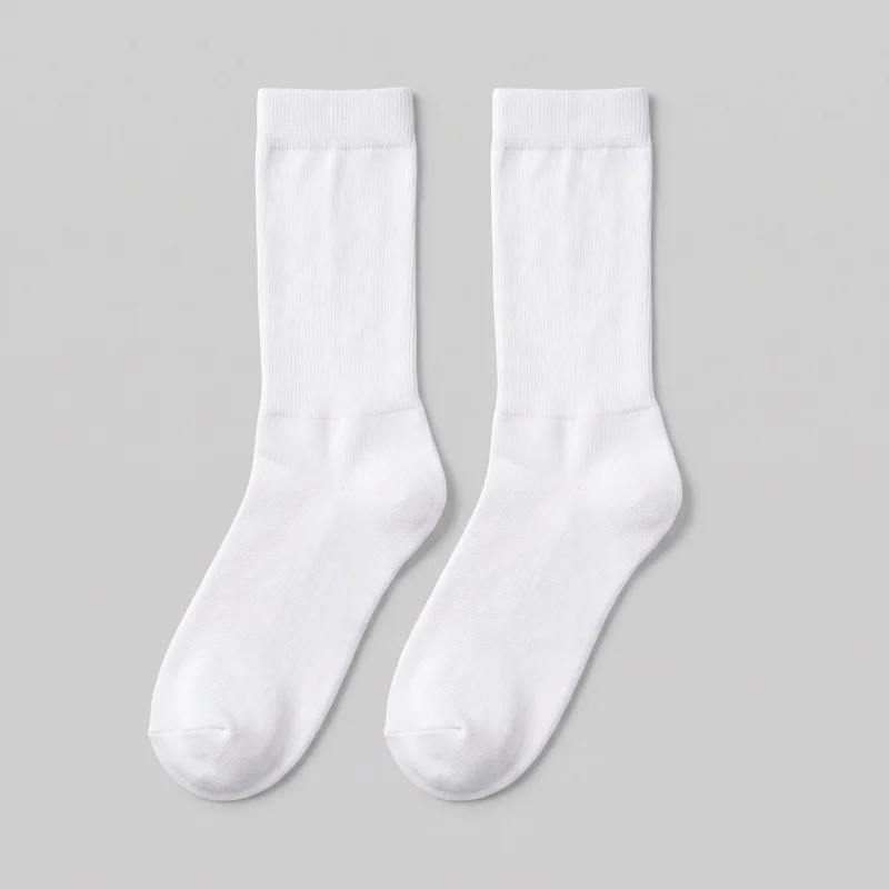 A complete pair of white crew-length socks is shown as a standalone product. The socks have wide folded-looking ribbed cuffs, vertically ribbed legs, shaped heel pockets, and rounded closed toes with visible toe seams.