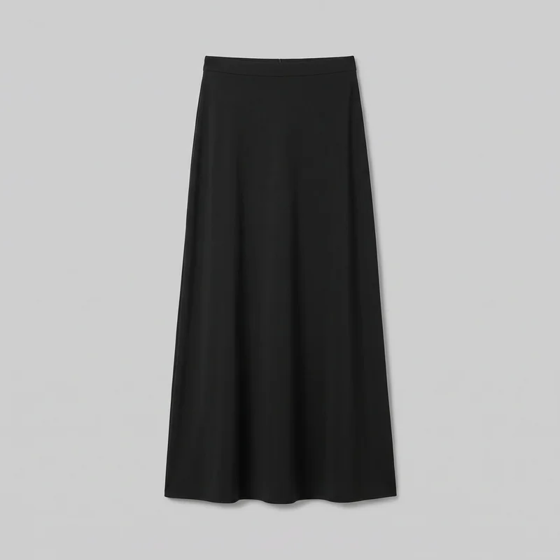 A plain black women's maxi skirt is laid flat in a full standalone view. It has a straight waistband, a smooth upper panel, a flared A-line body with soft vertical drape folds, and an even straight hem; no pockets, closures, logos, prints, patches, embroidery, or embellishments are visible.
