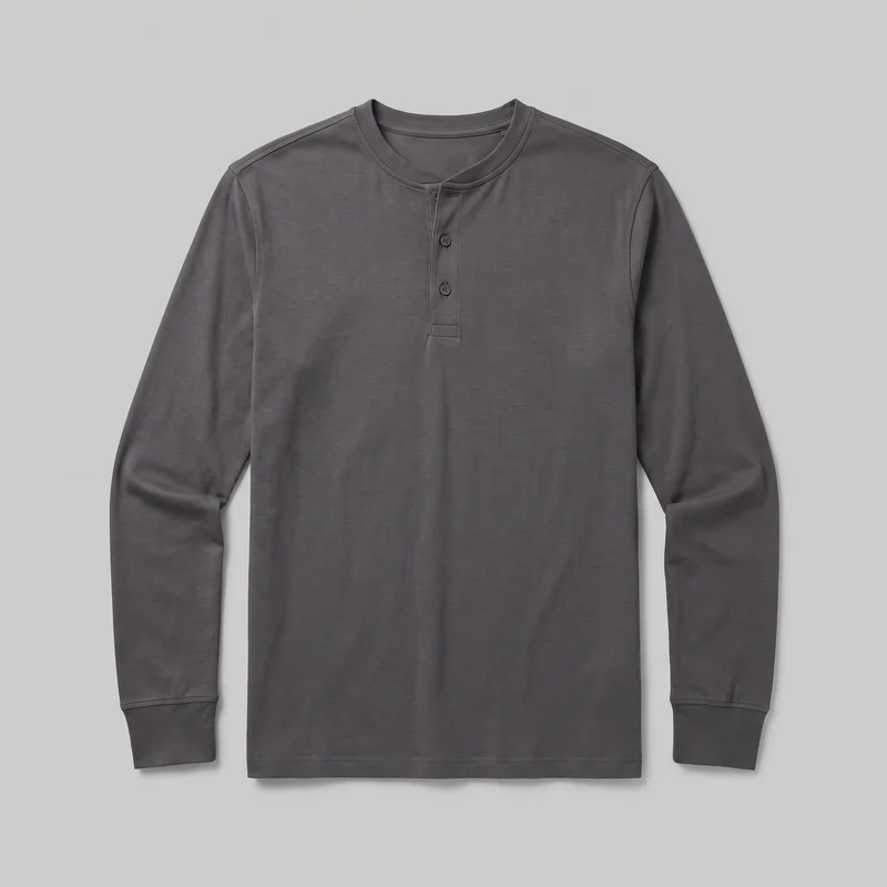 A standalone front view of a men's charcoal long-sleeve henley shirt. It has a round banded neckline, a short centered three-button placket with a reinforced base, set-in sleeves, ribbed cuffs, and a straight bottom hem.