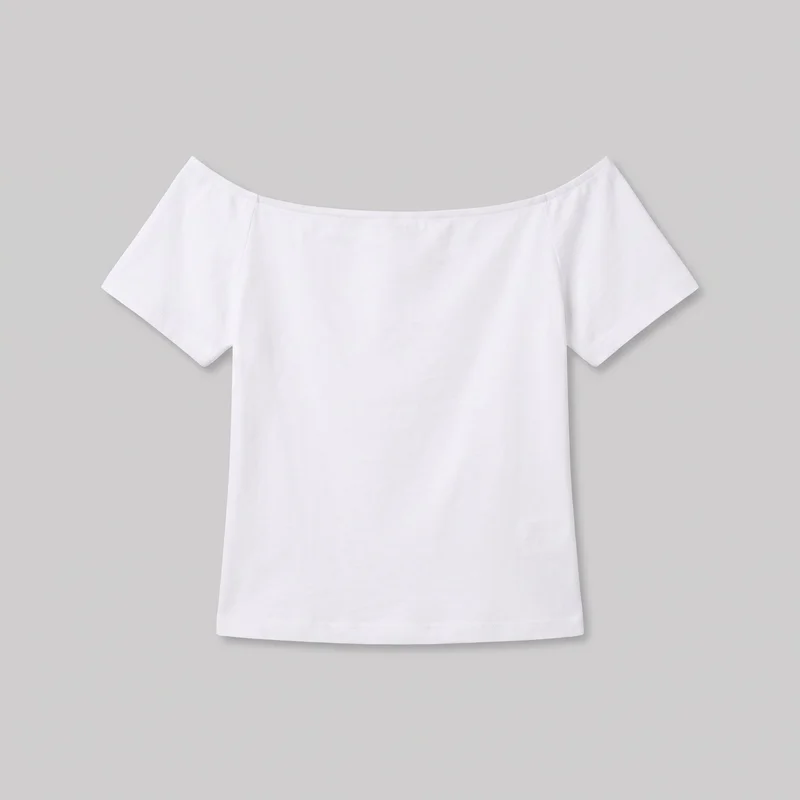 A white cotton off-the-shoulder short-sleeve top is shown in a complete front-facing standalone view. It has a wide curved neckline with visible edge stitching, short sleeves with slightly angled openings, a straight silhouette, subtle vertical seam lines near the upper sides, and a full-length straight hem with visible stitching.
