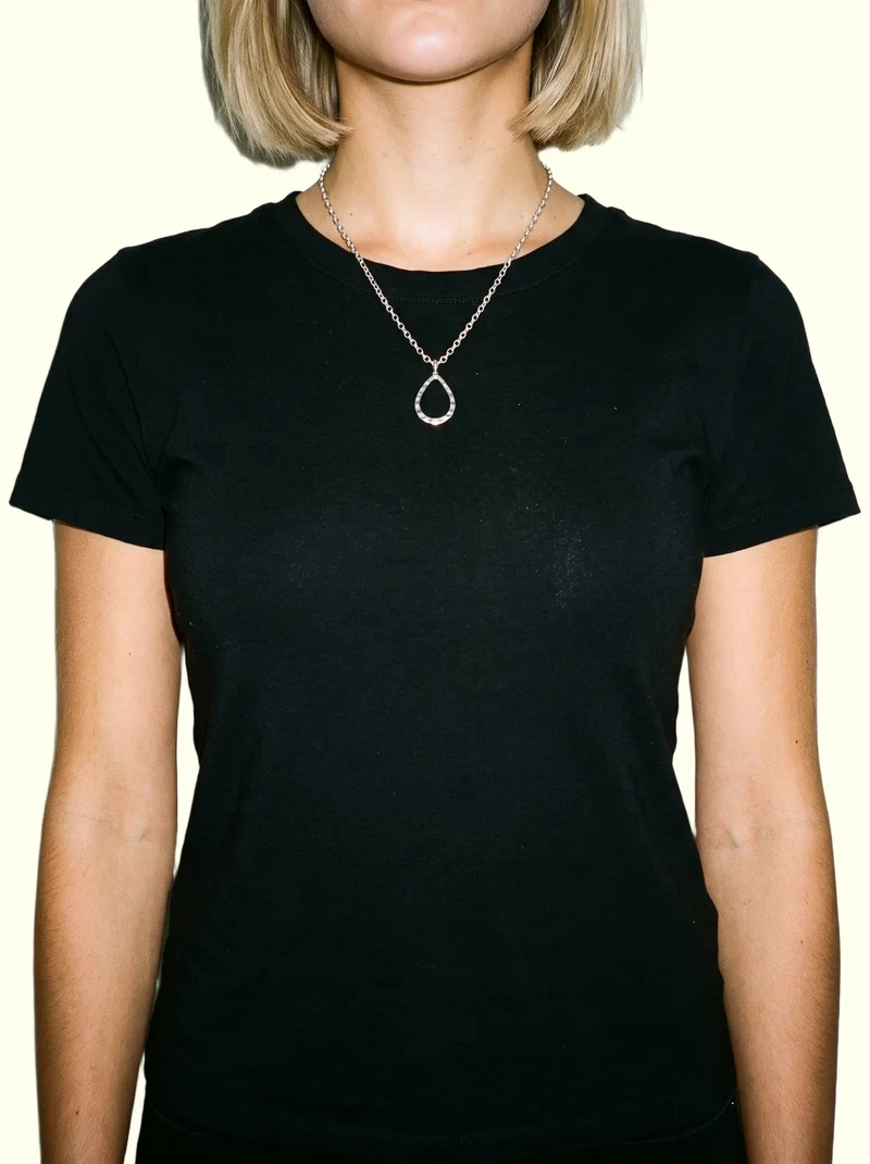 Women's Silver Pendant Necklace, Torso at Front, Studio Cutout lighting