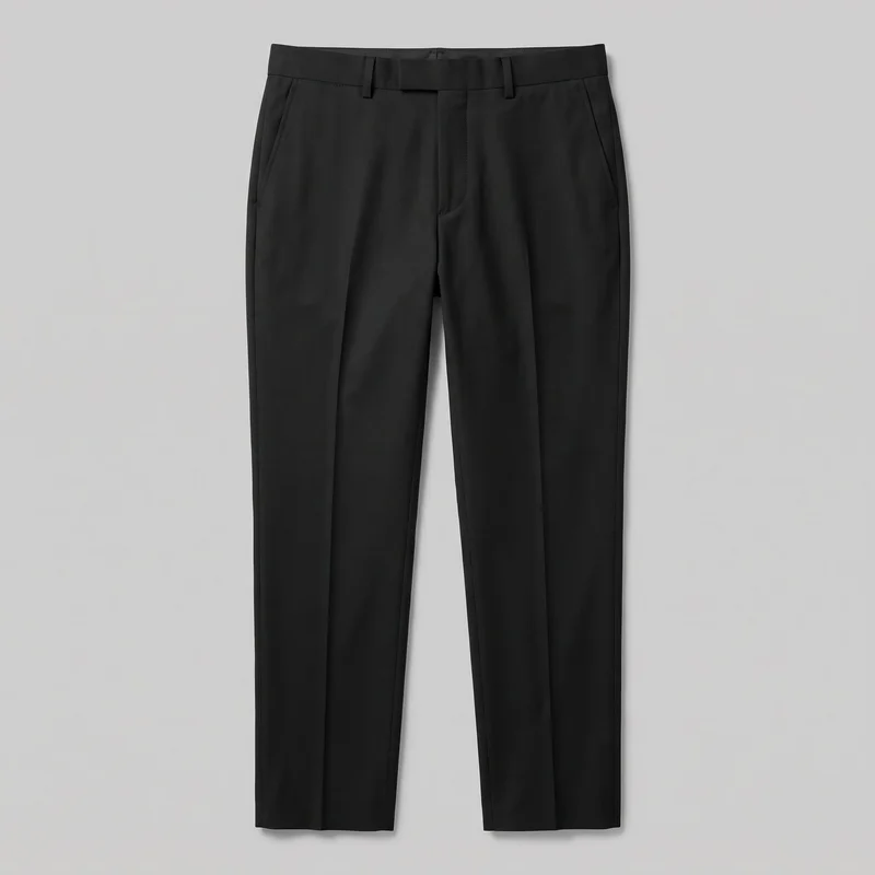 Men's black tailored dress trousers are shown laid flat in a complete front view. The trousers have a slim-to-tailored fit, a flat front, mid-rise waistband, belt loops, an extended waistband tab, concealed fly placket, two angled side slash pockets, full-length straight-to-slightly-tapered legs, straight hems, and clean vertical pressed creases.