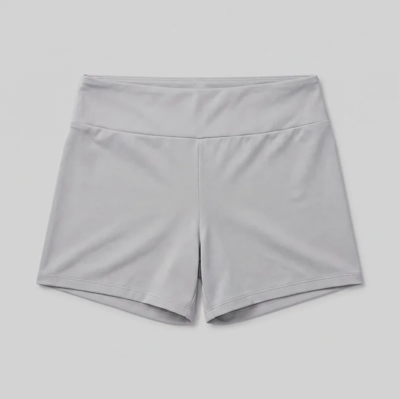 Grey women's high-waisted gym shorts shown alone in a flat full-front view. The shorts have a close-fitting silhouette, a wide smooth waistband, a central front rise seam, short legs, and straight stitched hems.