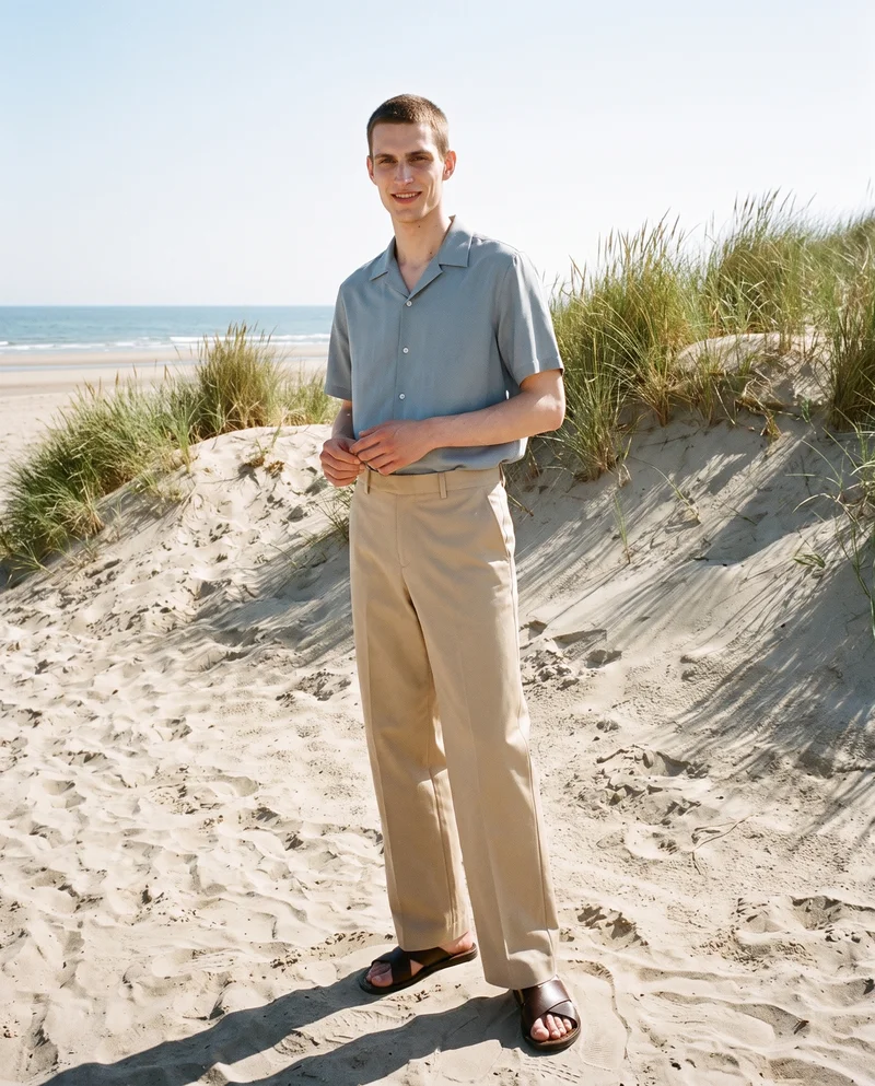 Men's Beige Wide-Leg Tailored Trousers, Full body at Three-quarter, Flash Editorial lighting