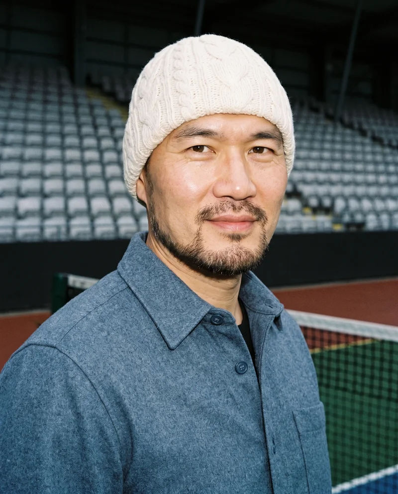 Men's Cream Cable-Knit Beanie, Bust at Three-quarter, Flash Editorial lighting