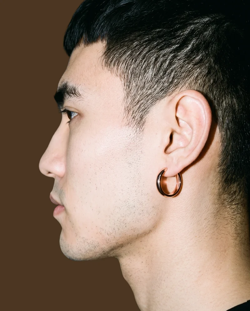 Men's Rose Gold Ear Cuffs, Ear at Side, Studio Cutout lighting