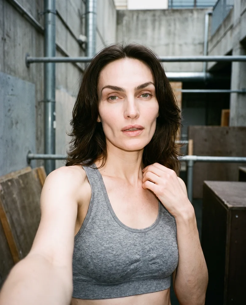 Grey Seamless Sports Bra, Selfie at Front, Natural E-Commerce lighting