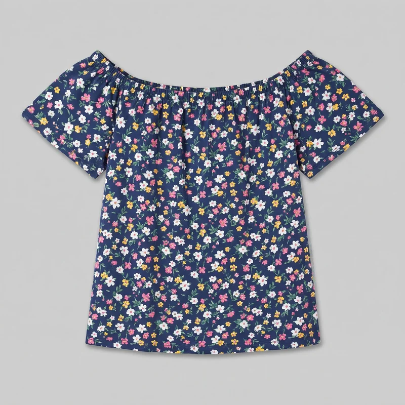 A standalone front view shows a relaxed-fit off-the-shoulder blouse with short wide sleeves, a wide elasticized gathered neckline, a straight body, and a straight stitched bottom hem. The blouse has an all-over small floral-and-leaf print, with no visible closures, pockets, logos, patches, embroidery, or other embellishments.