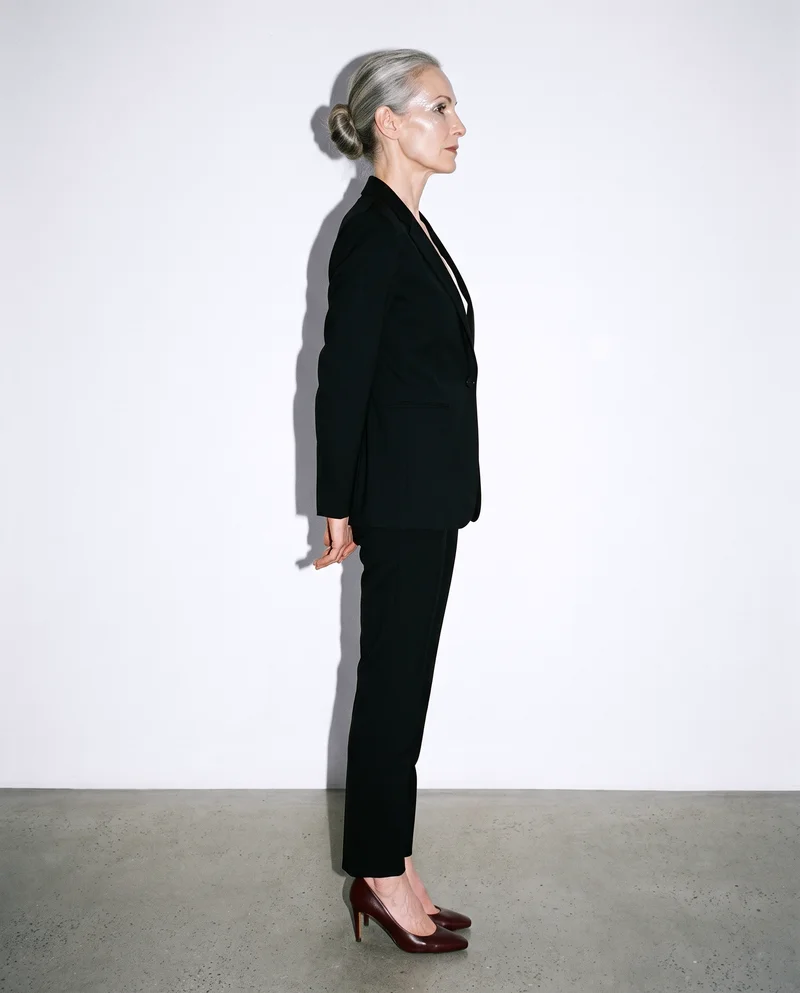 Black Tailored Trouser Suit, Full body at Side, Flash Editorial lighting