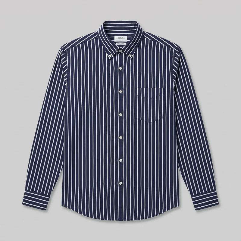 A navy striped Oxford shirt is shown laid flat in a standalone front view. The long-sleeve shirt has a pointed button-down collar, full front button placket, single left chest patch pocket, button cuffs, visible shoulder and side panel seams, and a curved shirttail hem.