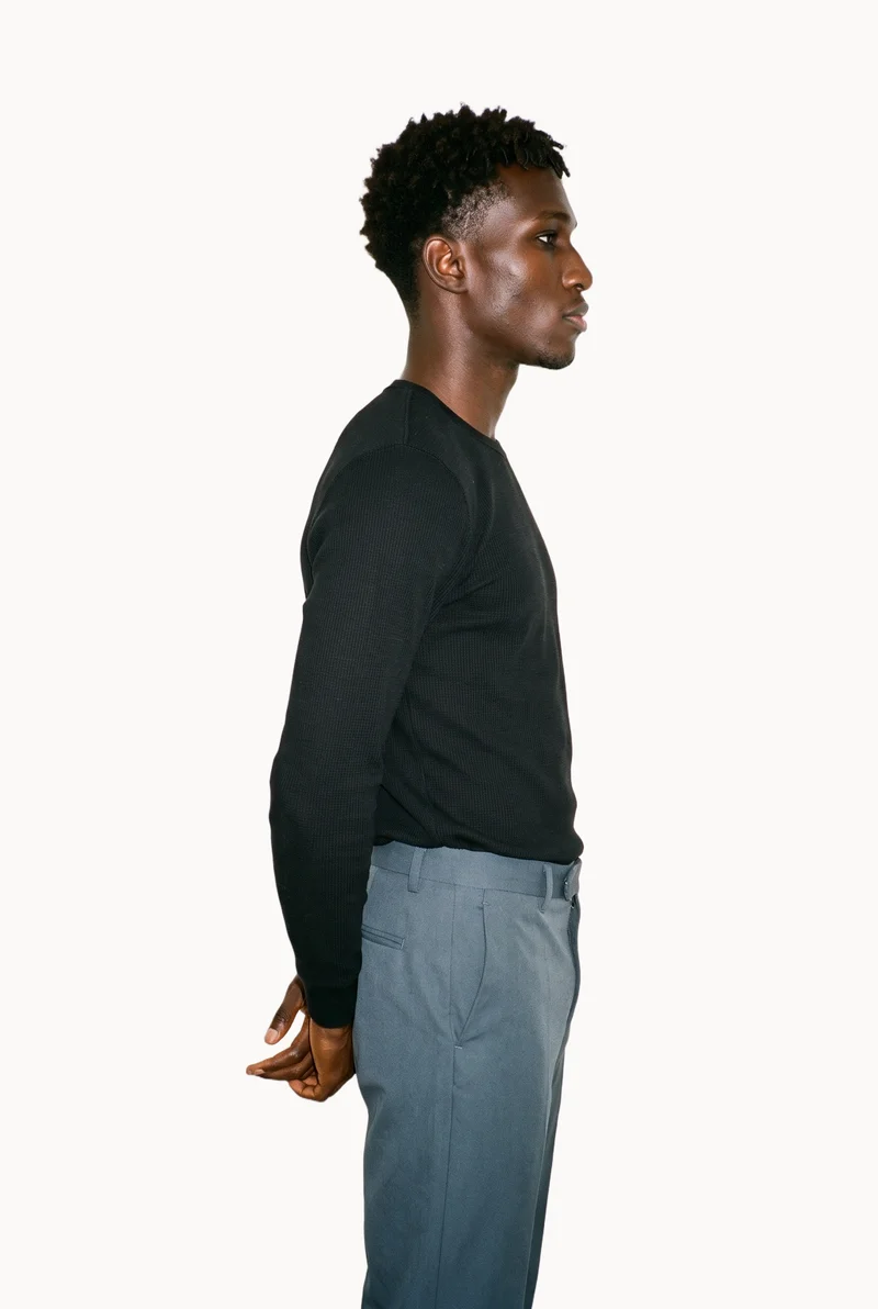 Men's Black Thermal Top, Three-quarter length at Side, Studio Cutout lighting