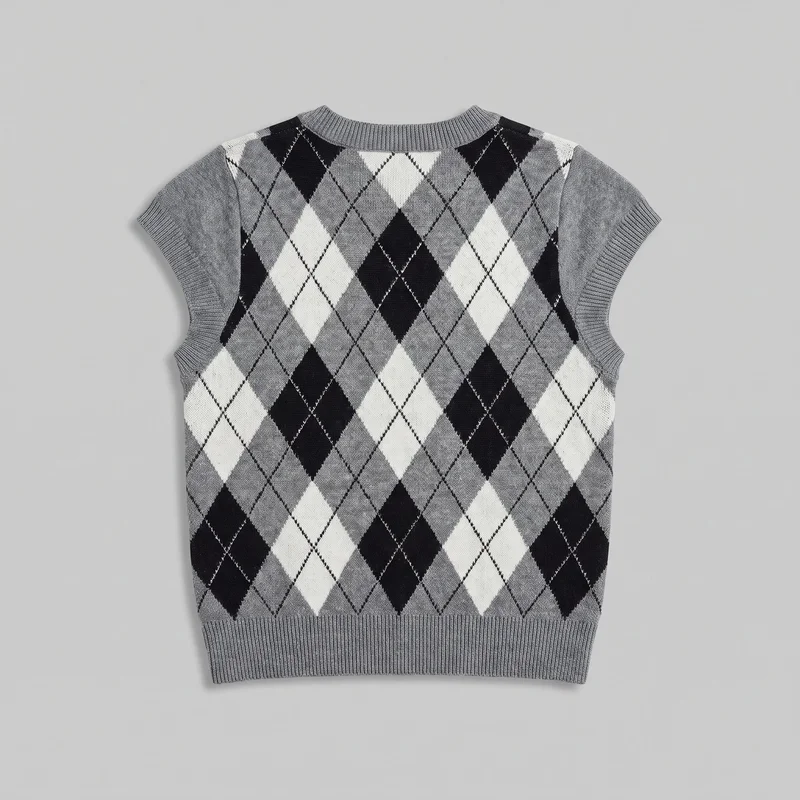 A grey women's sleeveless sweater vest is laid flat in a standalone front view. It has a straight regular silhouette, ribbed crew neckline, extended shoulder coverage, deep arm openings, a full-length body, and a straight ribbed hem. A large all-over argyle diamond pattern with fine diagonal stitch lines covers the front.