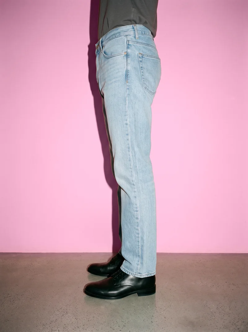 Men's Light Wash Straight Jeans, Lower body at Side, Flash Editorial lighting