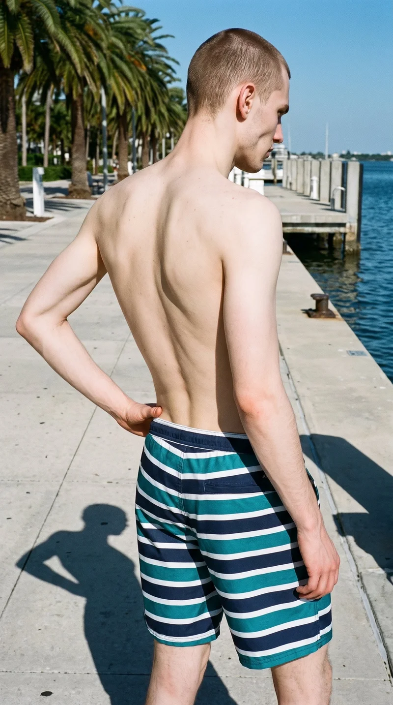 Striped Board Shorts, Three-quarter length at Angled rear, Flash Editorial lighting