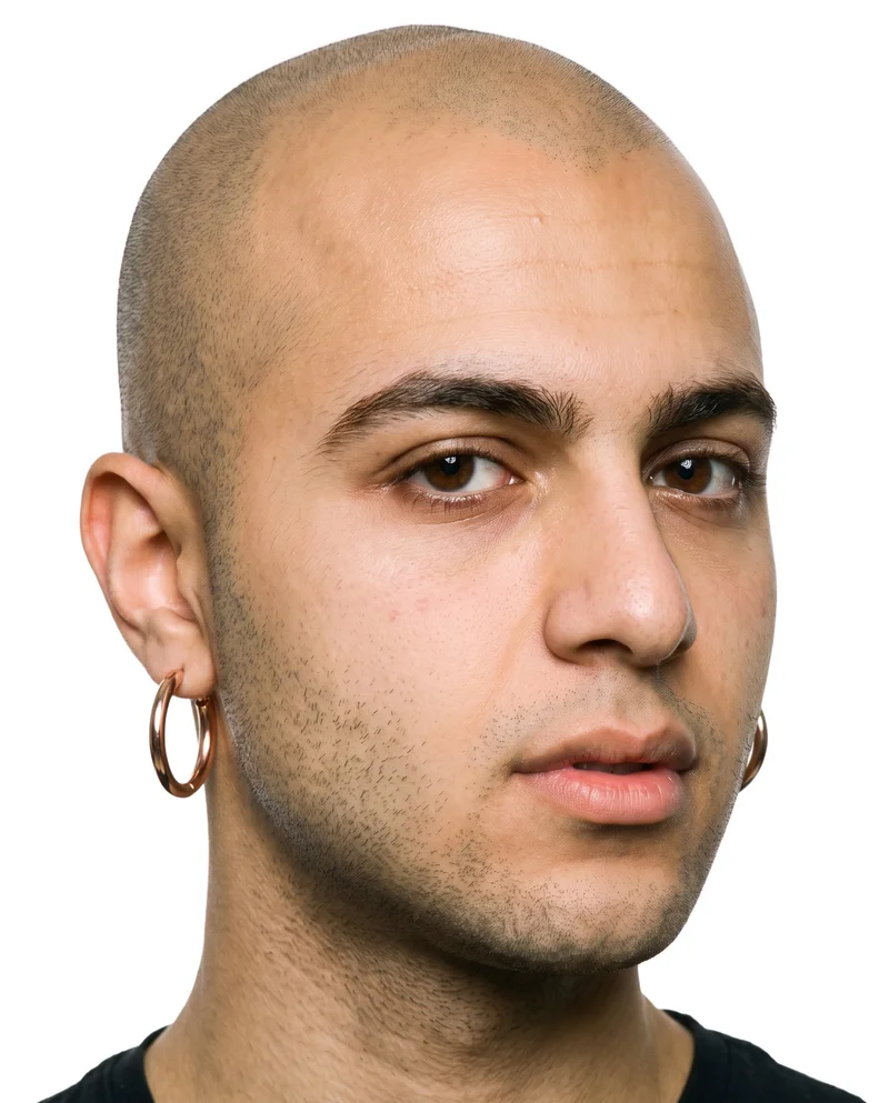 Men's Rose Gold Hoop Earrings, Head at Angled front, Studio Cutout lighting