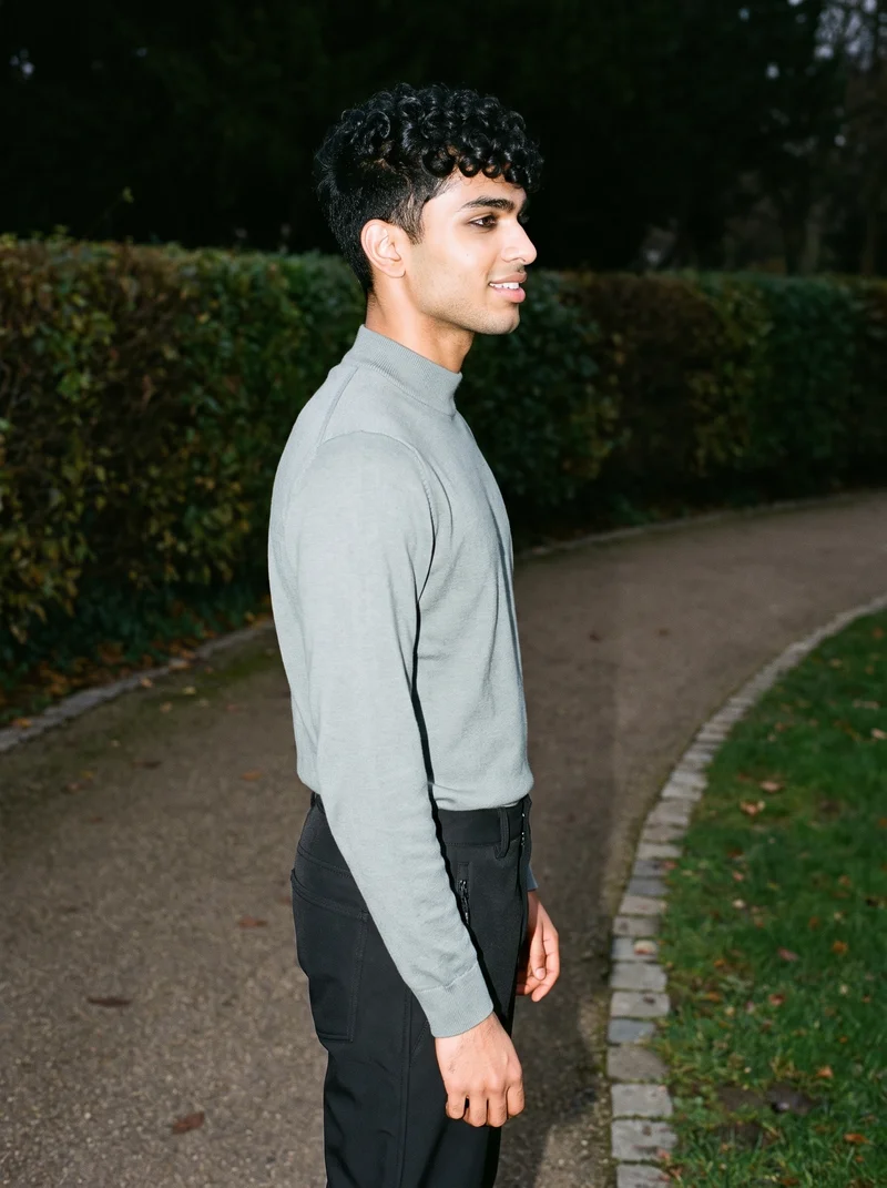 Men's Black Ski Trousers, Three-quarter length at Side, Flash Editorial lighting