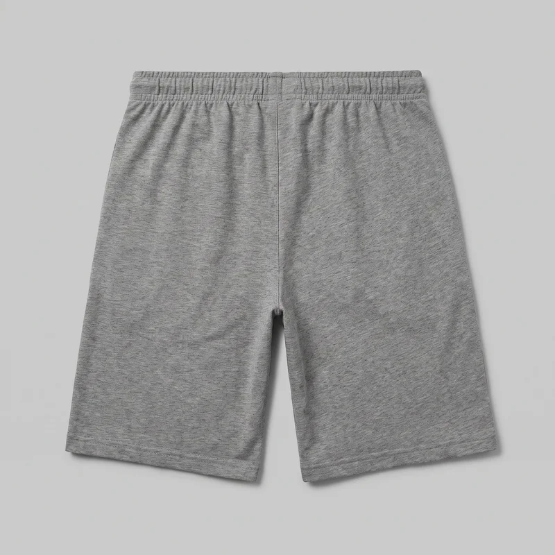 Grey adult pull-on jersey shorts shown in a flat front-facing view against a backdrop. The nearly complete garment has a wide stitched elastic waistband, a clean front with a centered rise seam, relaxed straight legs, and straight above-knee-style hems finished with double stitching. No pockets, drawstrings, logos, prints, patches, embroidery, or embellishments are visible.