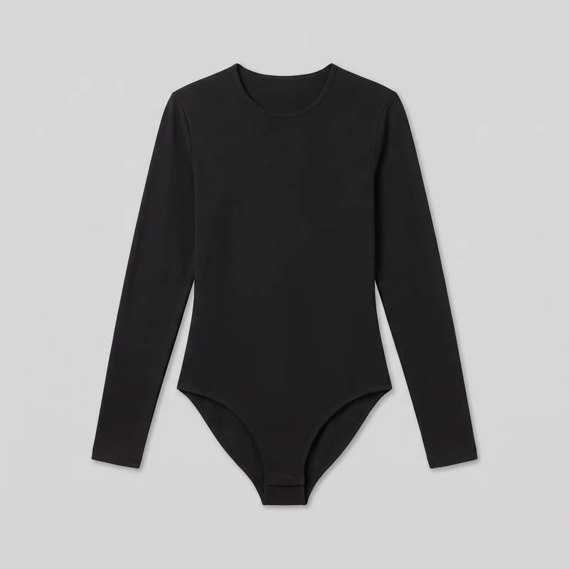 A mostly complete front flat-lay view of a black long-sleeve bodysuit. It has a round neckline, set-in shoulders, straight full-length sleeves, a slim body-skimming silhouette, and an integrated brief-style lower section with curved leg openings. Narrow stitched binding outlines the neckline and leg openings, and the sleeve hems and shoulder seams have stitched edges. The front is plain, with no visible pockets, closures, logos, prints, embroidery, or embellishments.