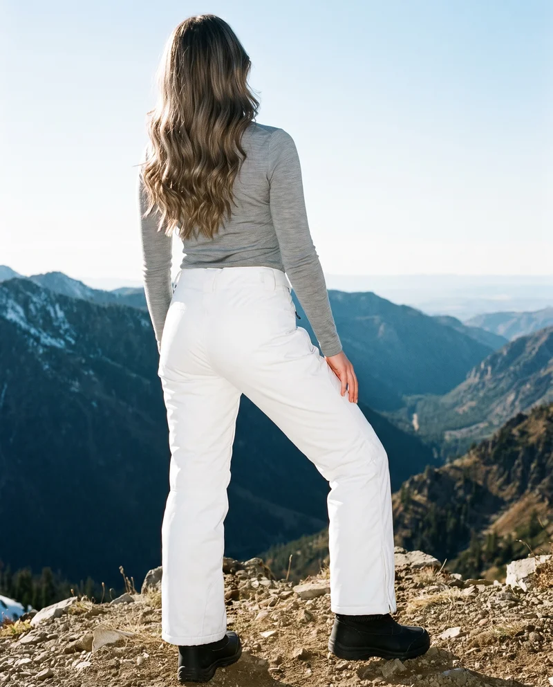 Women's White Shell Ski Trousers, Full body at Back, Natural E-Commerce lighting