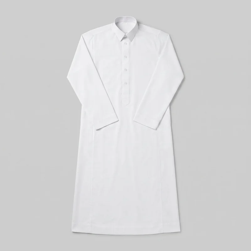 A white full-length men's thobe is shown as a standalone front view without a visible model or mannequin. It has a pointed shirt collar, short buttoned placket, long sleeves positioned inward over the body, a straight ankle-length silhouette, and a straight hem.