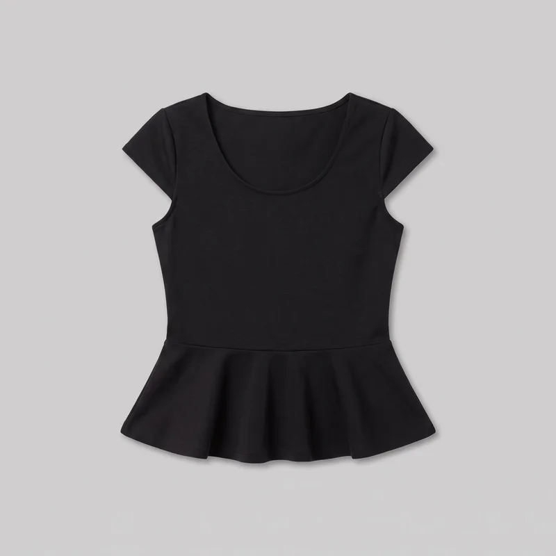 A black women's peplum top is shown laid flat in a standalone front view. The mostly complete garment has a slim, shaped bodice, a horizontal waist seam, a flared ruffled peplum hem, a scoop neckline with narrow bound edging, short cap sleeves, visible shoulder seams, curved armholes, and stitched hems. No closures, pockets, logos, prints, embroidery, or embellishments are visible.