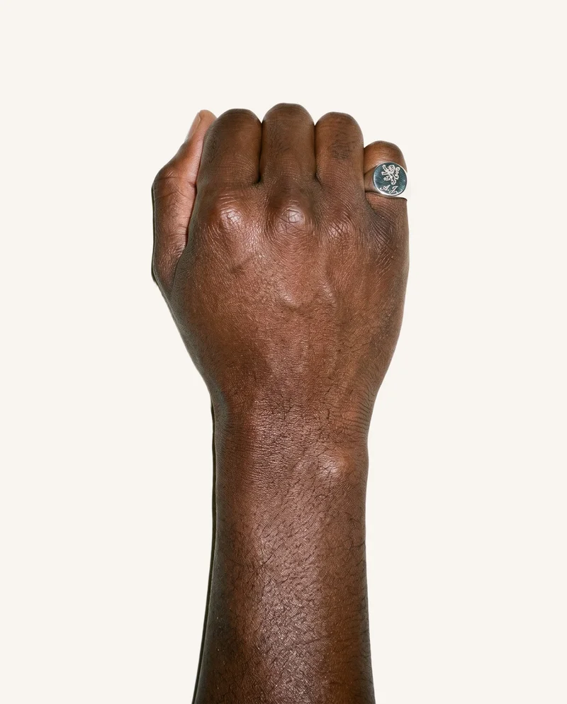 Engraved Signet Ring, Hand and wrist at Top, Studio Cutout lighting