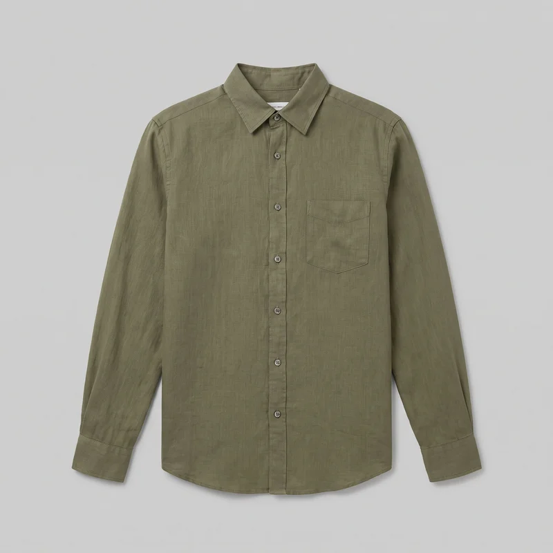 Olive linen long-sleeve button-up shirt laid flat in a mostly complete front view. It has a pointed fold-down collar, narrow button placket, single patch chest pocket with an angled lower point, set-in shoulders, visible seams, simple cuffs, and a gently curved shirttail hem. The plain fabric has a subtle woven crosshatch texture with no visible logos, prints, embroidery, or embellishments.
