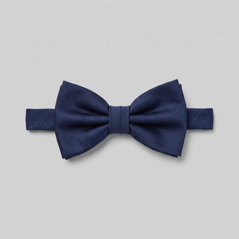 A complete navy pre-tied bow tie is shown laid flat from the front. It has a symmetrical double-wing bow with softly folded, gathered sections leading into a narrow vertical center wrap, plus a straight neck band extending horizontally on both sides with clean squared visible ends. No logos, prints, patches, embroidery, or embellishments are visible.