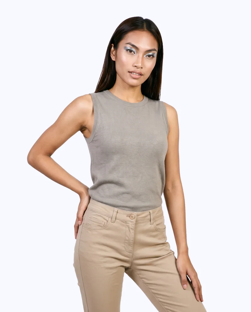 Women's Beige Slim Chinos, Three-quarter length at Front, Studio Cutout lighting