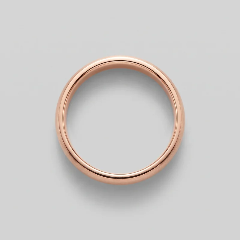 A standalone men's rose gold band ring with a continuous circular slip-on shape. Its rounded domed exterior has a smooth raised center and narrow recessed grooves running parallel near both outer edges; the inner opening is visible, with no stones, logos, engravings, or other embellishments.