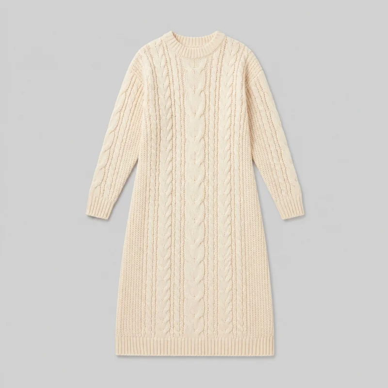 Cream long-sleeve cable-knit sweater dress shown in a complete flat-lay front view. It has a straight relaxed silhouette, high round ribbed neckline, slightly dropped shoulders, tapered sleeves with ribbed cuffs, vertical cable and openwork-style knit patterning, and a straight ribbed lower hem.