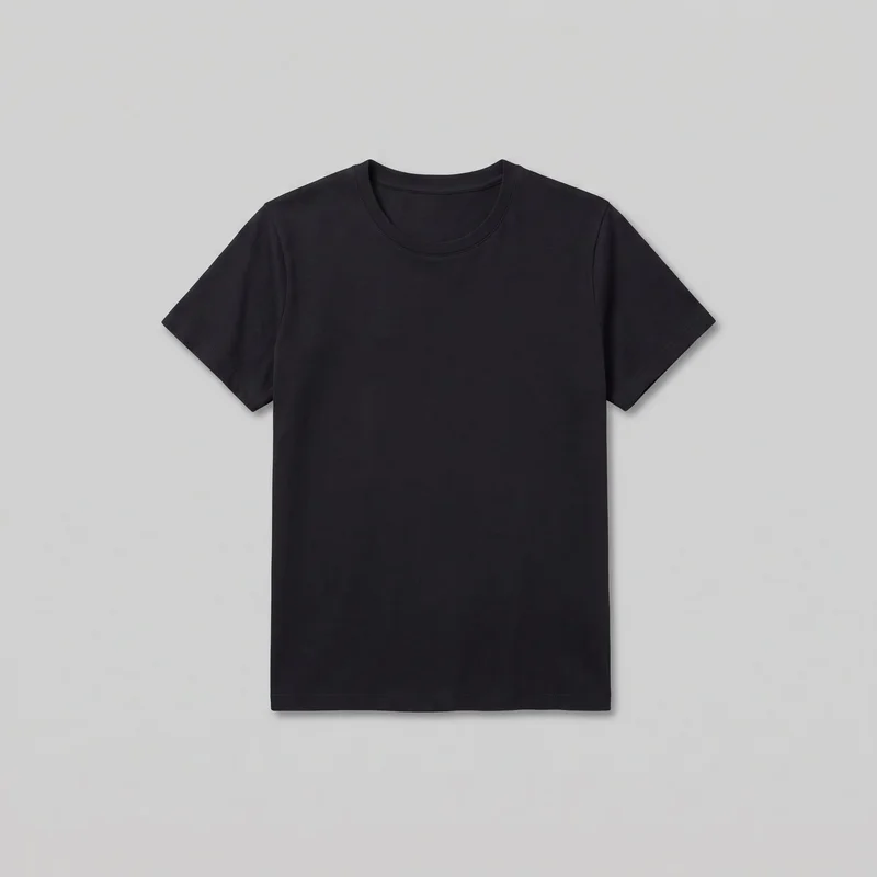 A plain black women's short-sleeve crew-neck T-shirt is shown as a complete standalone garment, viewed from the front in a flat view. The shirt has a regular straight silhouette, set-in shoulders, a rounded ribbed neckline, short sleeves, and a straight full-length bottom hem. Stitched neck binding, shoulder seams, sleeve hems, and the bottom hem are visible; no pockets, closures, logos, prints, patches, embroidery, or embellishments are visible.