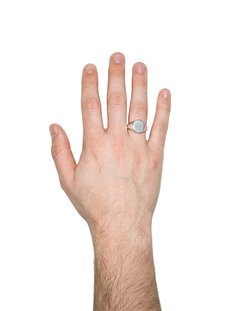 Silver Signet Ring, Hand and wrist at Top, Studio Cutout lighting