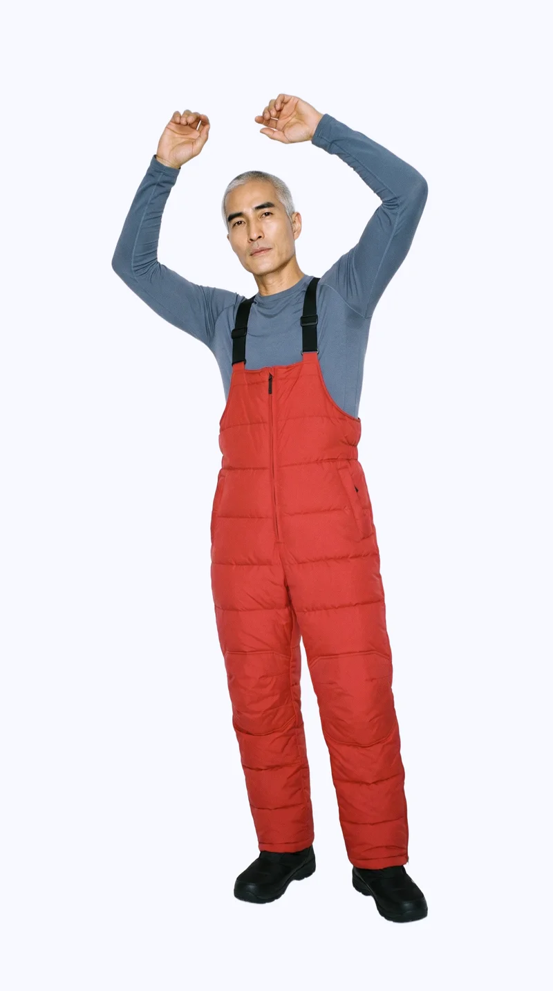 Men's Red Padded Salopettes, Full body at Three-quarter, Studio Cutout lighting