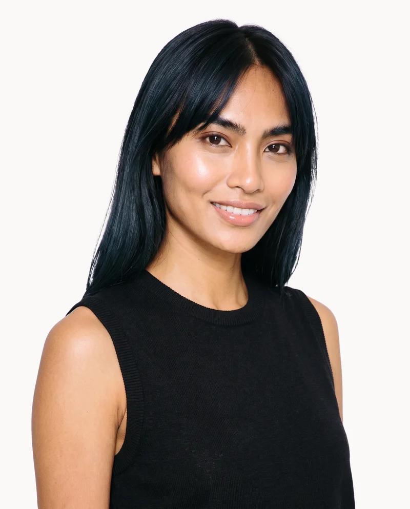 Women's Black Sweater Vest, Selfie at Front, Studio Cutout lighting
