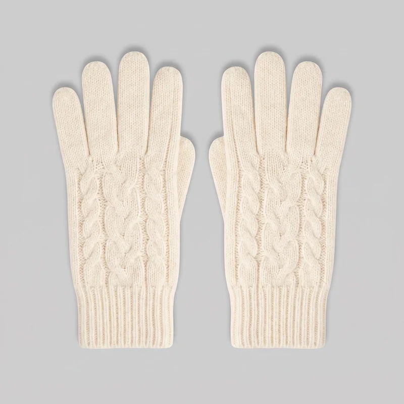 A matching pair of men's cream full-finger knit gloves is laid flat with the backs facing up. The gloves have separate rounded fingers and thumbs, raised vertical cable-knit panels on the backs of the hands, smoother vertical knit texture on the fingers, and extended straight ribbed cuffs.