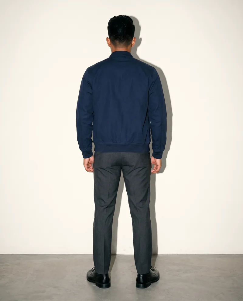 Men's Navy Bomber Jacket, Full body at Back, Flash Editorial lighting
