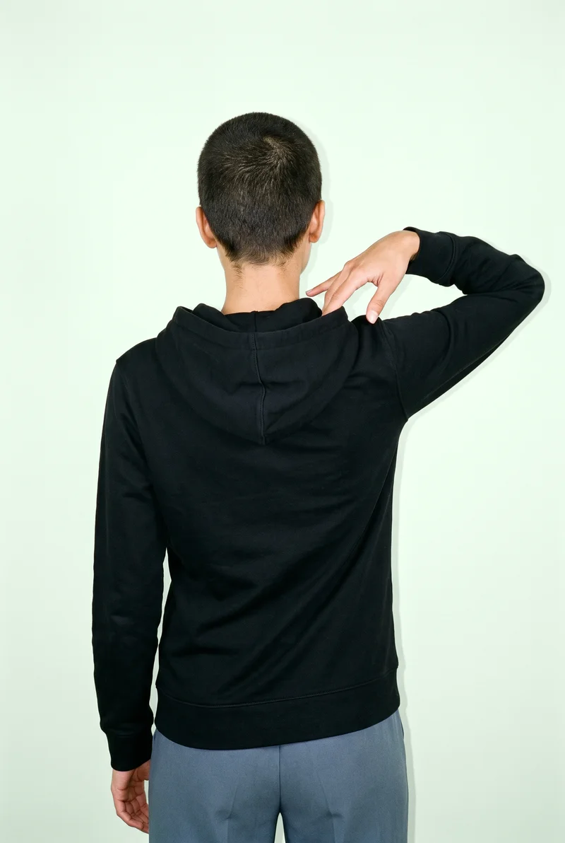 Women's Black Pullover Hoodie, Upper body at Back, Clean Catalog lighting