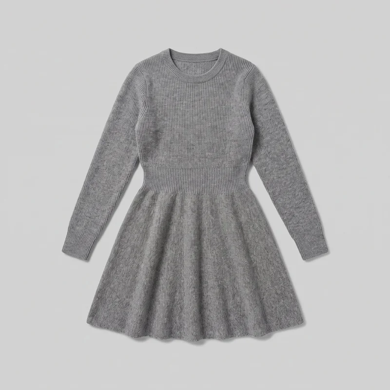 Grey knitted fit-and-flare dress shown in a standalone front-facing flat lay. It has a ribbed crew neckline, long tapered sleeves with ribbed cuffs, raglan-style seams, vertical ribbing through the fitted bodice, a wide ribbed waistband, and a gathered or gently pleated skirt with a softly curved hem.