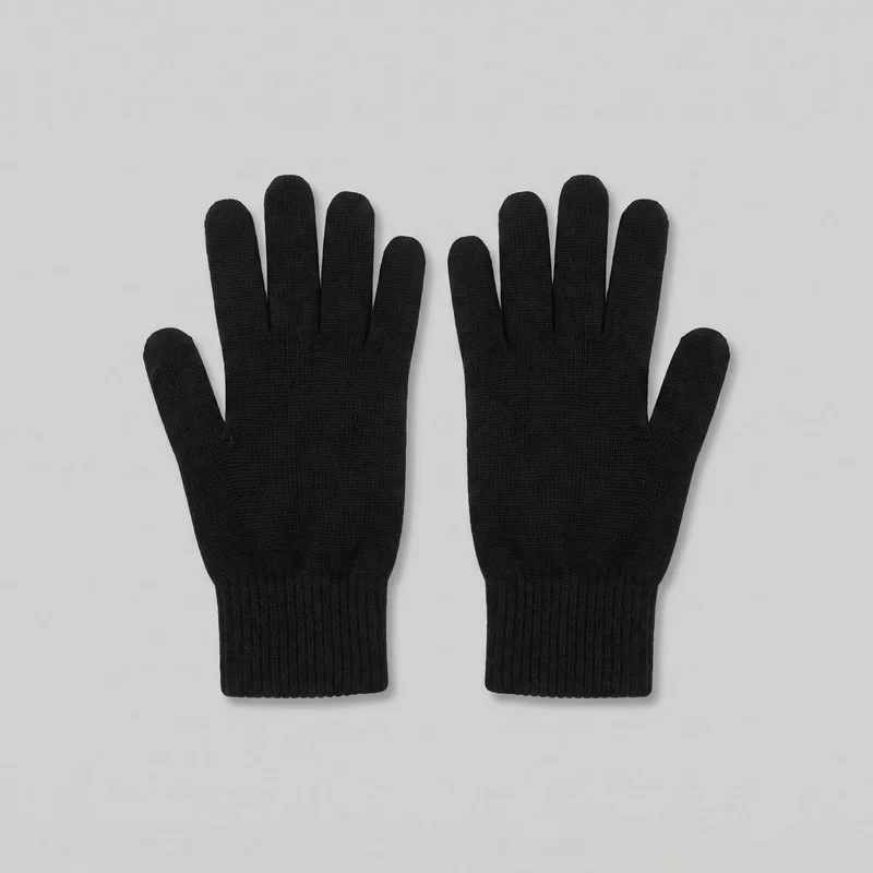 A pair of black full-finger knit gloves is laid flat, showing the separate rounded fingers, thumbs, and elongated wrist cuffs. The gloves have a fine knit surface with vertical ribbing at the cuffs and no visible closures, hardware, logos, prints, patches, embroidery, or embellishments.