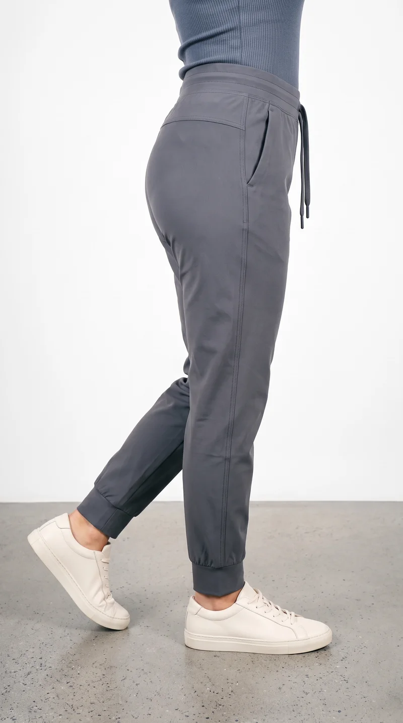 Women's Charcoal Tech Joggers, Lower body at Side, Clean Catalog lighting